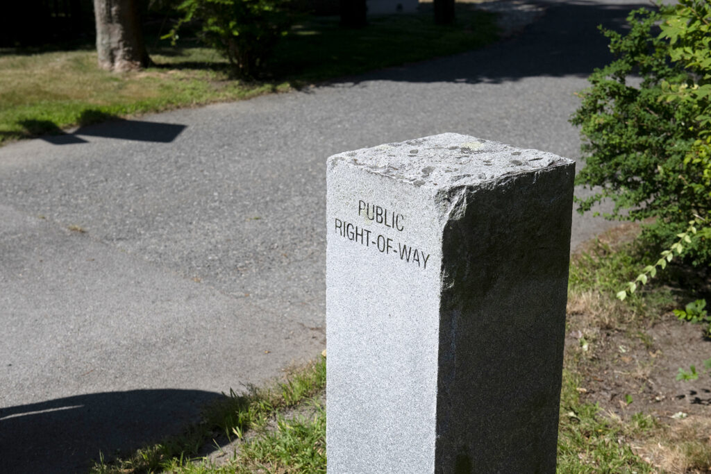 Granite marker reads "Public Right of Way"