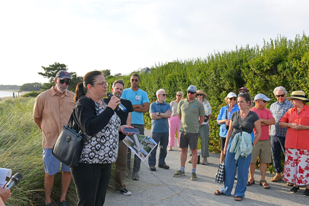 Teresa Crean speaks to a crowd gathered at Barrington Town Beach