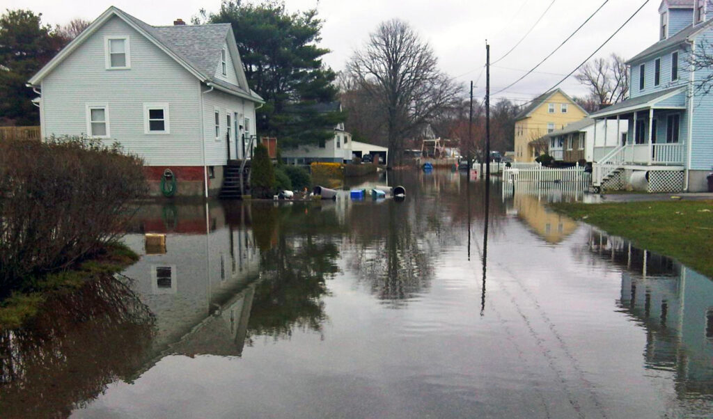 Homes along a flooded street