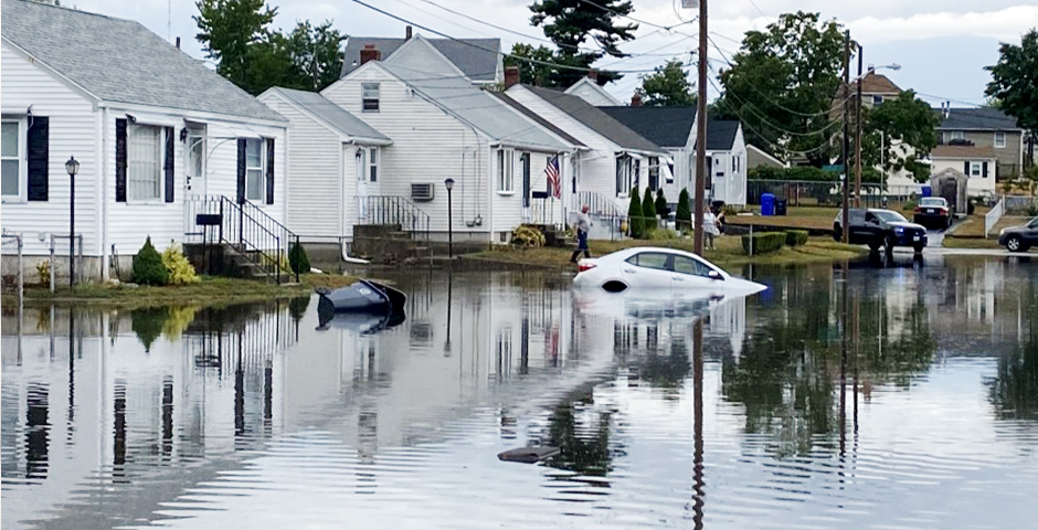 Flooding of Cape Cod style homes, street