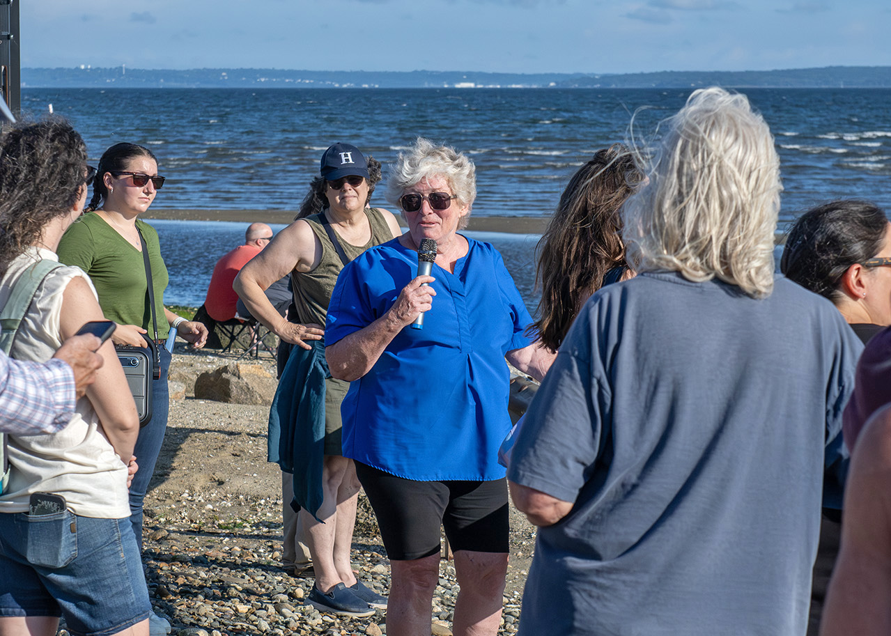 DSC_5880-leslie-derrig-marsh-crop Leslie Derrig talks to the crowd on the beach in front of the bay