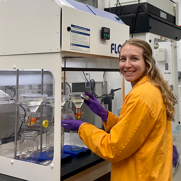 Davis_plastics Dr. Sarah Davis in the lab extracting samples of microplastic from samples of seawater taken from Narragansett Bay.