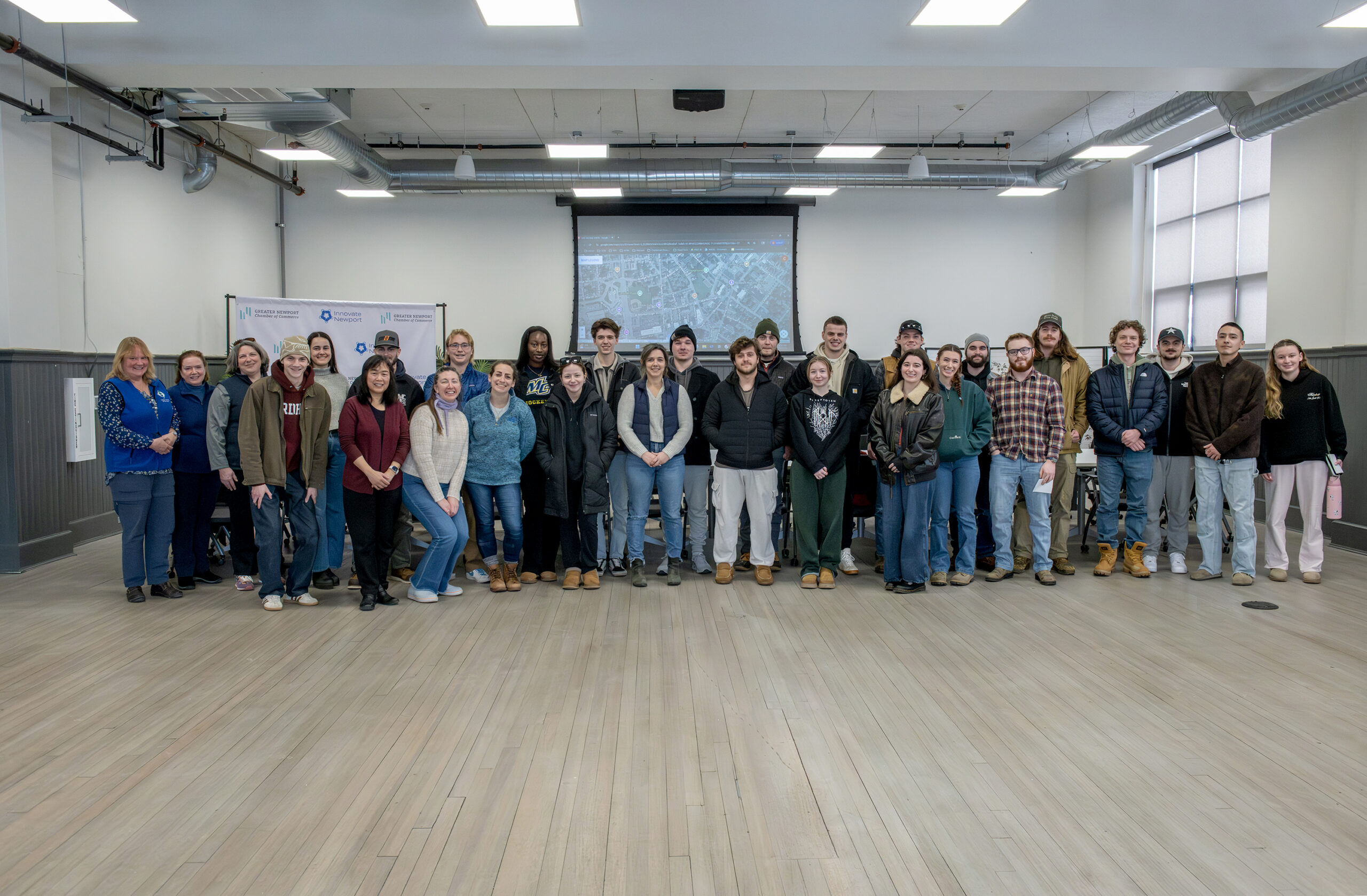Group of 30 people in a large room